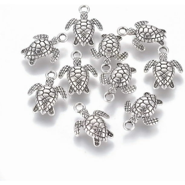 20 dijes de aleación con forma de tortuga para hacer bisutería. Ideales para crear collares, pulseras y pendientes.