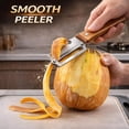 thumbnail image 7 of 2026 New Zero Snag Wooden Kitchen Tool, Thickened Multifunctional Stainless Steel  Wood Handle Fruit Peeler, peelers for kitchen for Potato Apple Pumpkin Papaya, 7 of 7