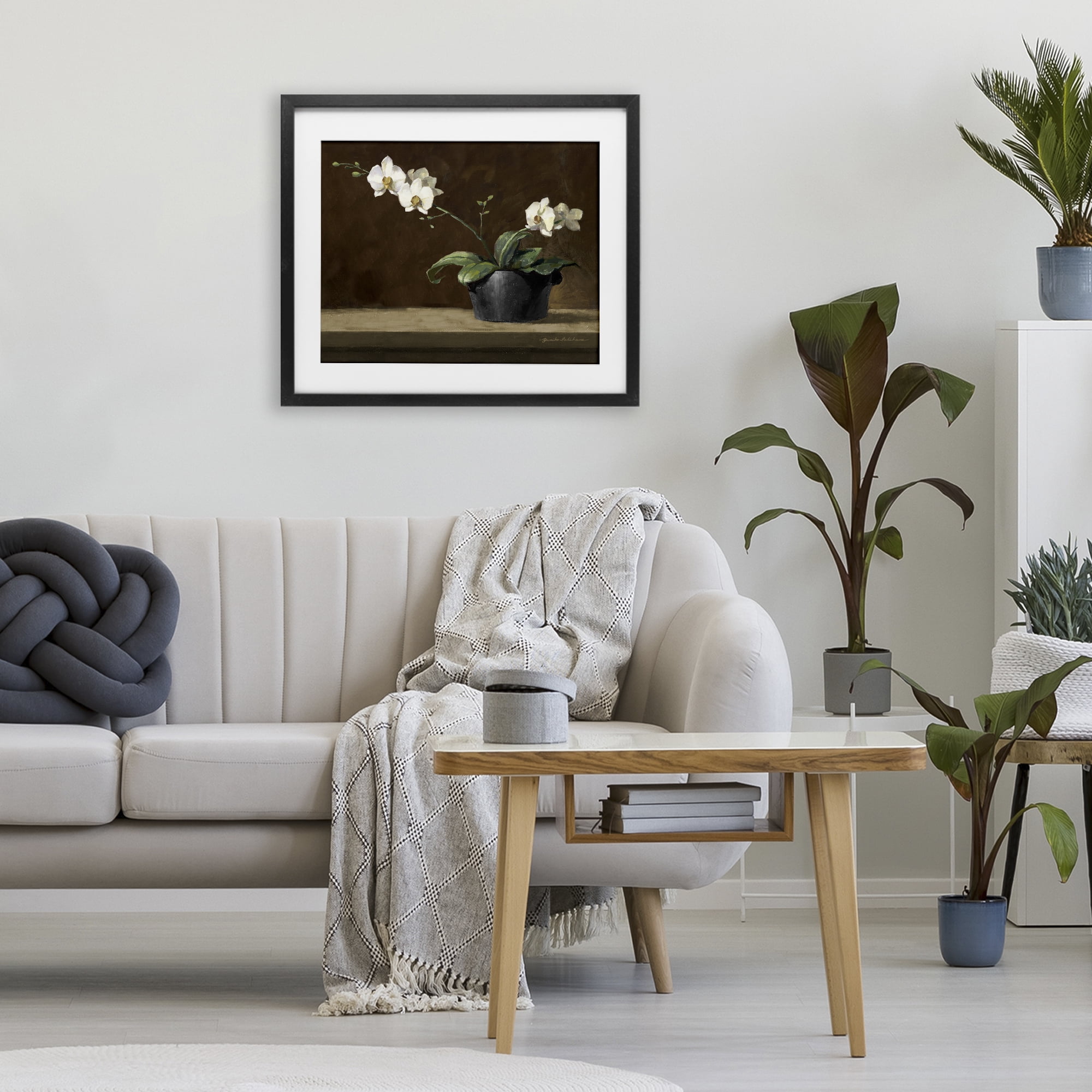 Stupell Industries Potted White Orchid on Ledge Black Framed Print Under Glass, design by Yumiko Ichikawa