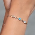 thumbnail image 4 of Gem Stone King 925 Silver and 10K Yellow Gold Peach Morganite Swiss Blue Topaz Moissanite and Lab Grown Diamond Tennis Bracelet for Women By Keren Hanan (2.15 cttw, Adjustable up To 9 inch), 4 of 4
