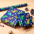 thumbnail image 2 of Christmas Wrapping Paper Roll - 17 Inches X 33 Feet (47 sq. ft. ttl.) Happy Dinosaur and Santa Claus Design Blue Gift Wrap for Xmas, Holiday, Party, 2 of 14