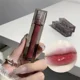 thumbnail image 4 of Lápiz labial de cristal espejo marrón rojo oscuro cosmético de larga duración mujeres Sexy tinte de labios maquillaje mate terciopelo castaño brillo de labios impermeable, 4 of 6