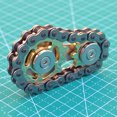thumbnail image 4 of Vogacara Fingertip Toys Gyro Sprocket Flywheel Fingertip Metal Toy Gear Chain Roadbike Flywheel Fingertip Toys Juguetes Engranaje de acero inoxidable dorado Vogacara FN000339-02B, 4 of 6