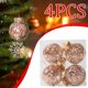 thumbnail image 4 of Juego de cuatro piezas Diseños: Un juego de cuatro bolas navideñas de diseño único, cada una decorada con rafia transparente, con una apariencia moderna., 4 of 6