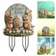 thumbnail image 1 of Huevos y conejitos de Pascua de colores insertados en el suelo. Tapón de tierra acrílico., 1 of 6