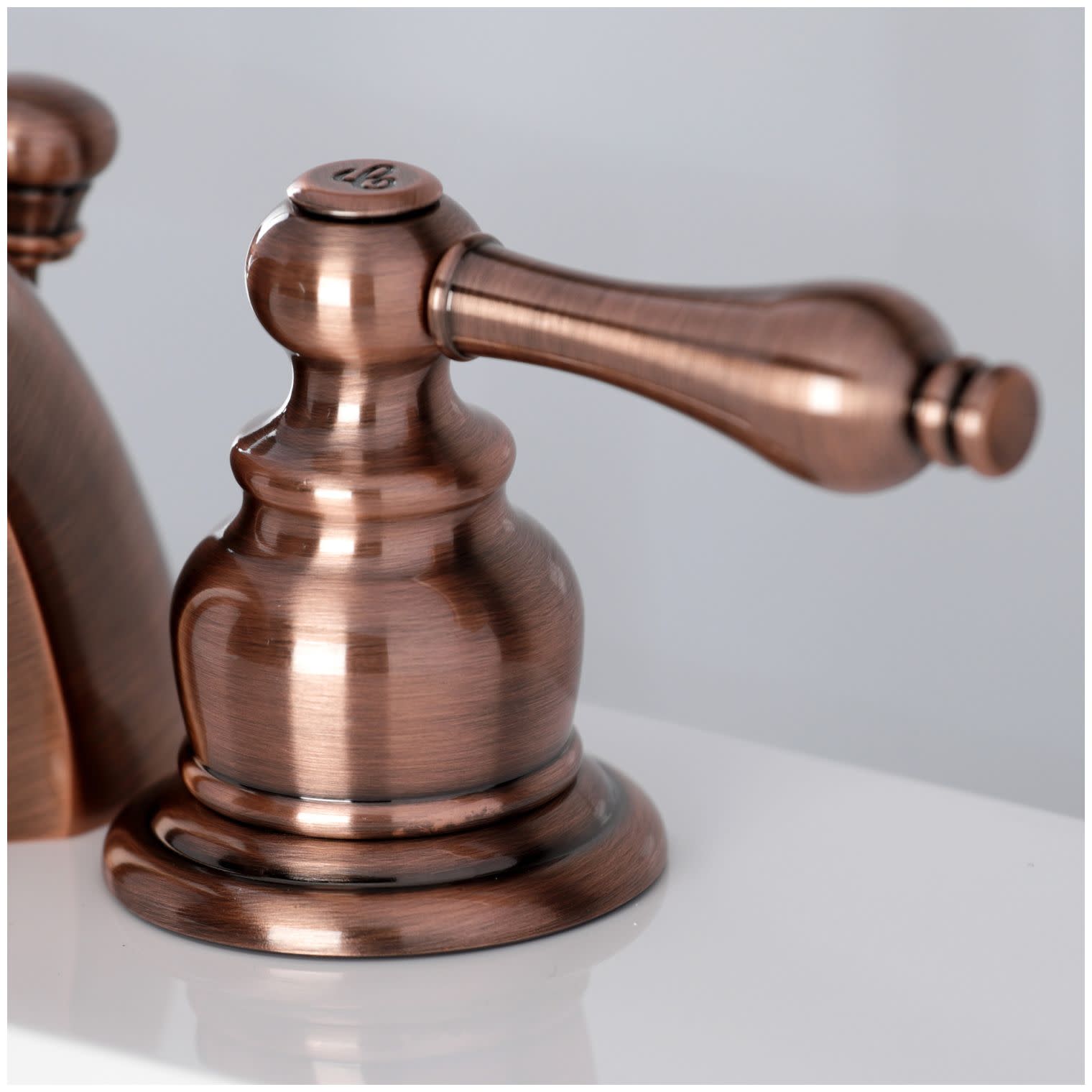 Kingston Brass Victorian Two Handle 4" to 8" Mini Widespread Lavatory Faucet with Retail Pop-up