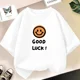 thumbnail image 4 of Camiseta de algodón con estampado de sonrisas para niñas, camisetas informales de verano de manga corta con cuello redondo para niños, camisetas para bebés, ropa para niños, 4 of 5