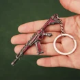 thumbnail image 5 of Llavero Valorant, arma Reaver VFX, cuchillo Karambit Vandal, colección de aspectos de juego de metal Reaver, espada samurái, figura de anime, juguetes para niños, 5 of 5