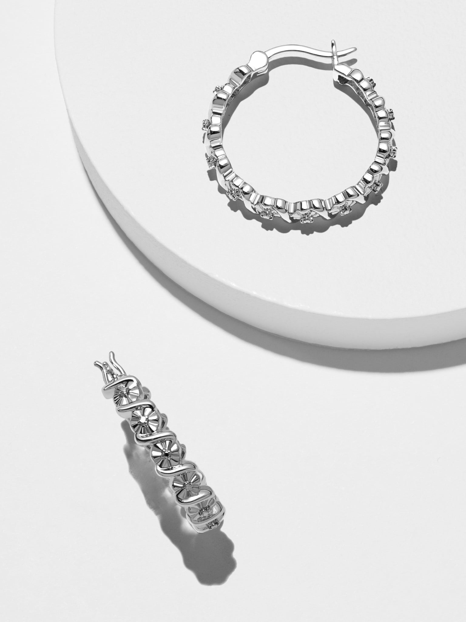 Forever Facets Fine Silver Plated Silver Tone S Link Miracle Illusion Diamond Accent Hoop Earrings,