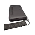 thumbnail image 4 of Cartera Steve Madden color negro, con correa de muñeca color negra con letras grabadas, 4 of 4