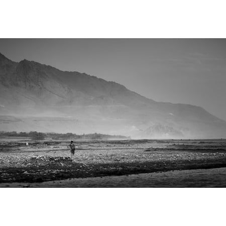 LAMINATED POSTER BAGRAM AIR FIELD, AfghanistanTwo local Afghans walk across a river valley in Mahmood Raqi Distri Poster Print 24 x