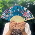 thumbnail image 1 of YAOMOBB Stylish Folding Fan Portable Japanese Style Decorative Bamboo Hollow Out Photo Prop Folding Classical Dance Photo Print, 1 of 6