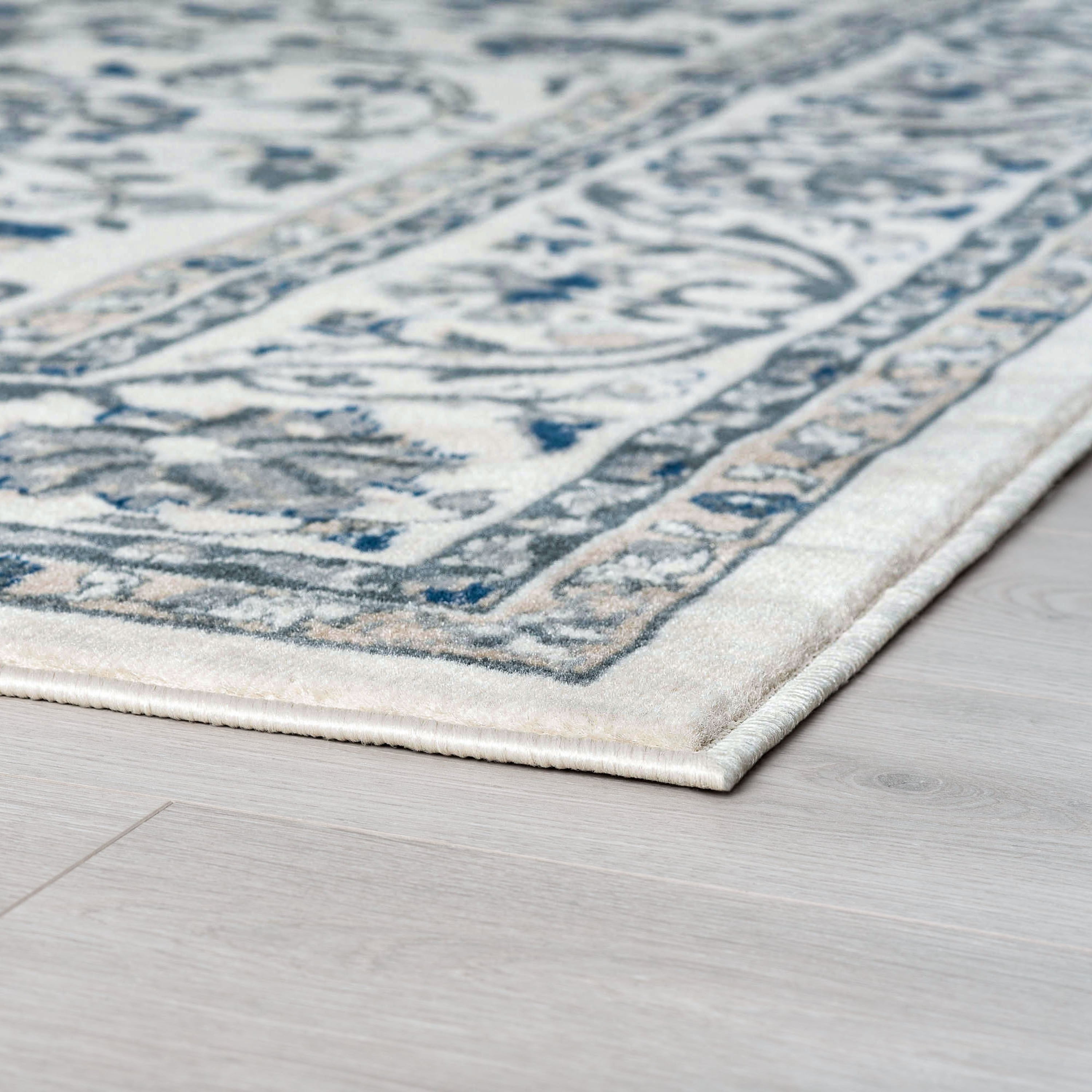 Madison Traditional 5' x 7' Cream Polypropylene Indoor Area Rug