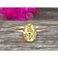 thumbnail image 1 of 1.25 carat Classic 8x6mm Oval Champagne Diamond Moissanite Solitaire Engagement Ring on 10k Yellow Gold, 1 of 6