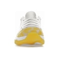 thumbnail image 3 of Jordan Women's 11 Retro Low Yellow Snakeskin Basketball Shoes, from StockX, 3 of 5