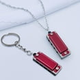 thumbnail image 1 of Mini Harmonica 4 Trous 8 Tons / Orgue à Bouche Compact Portable / Résine Métallique Rouge / Instrument de Musique Adapté aux Débutants / Cadeau Durable et Abordable / 10g / 34x13x11mm, 1 of 5