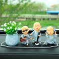 thumbnail image 3 of Figuras de acción de monjes budista, adornos de coche, decoración de monje, salpicadero Interior automotriz, accesorios de Voiture, regalos para niños, 3 of 3