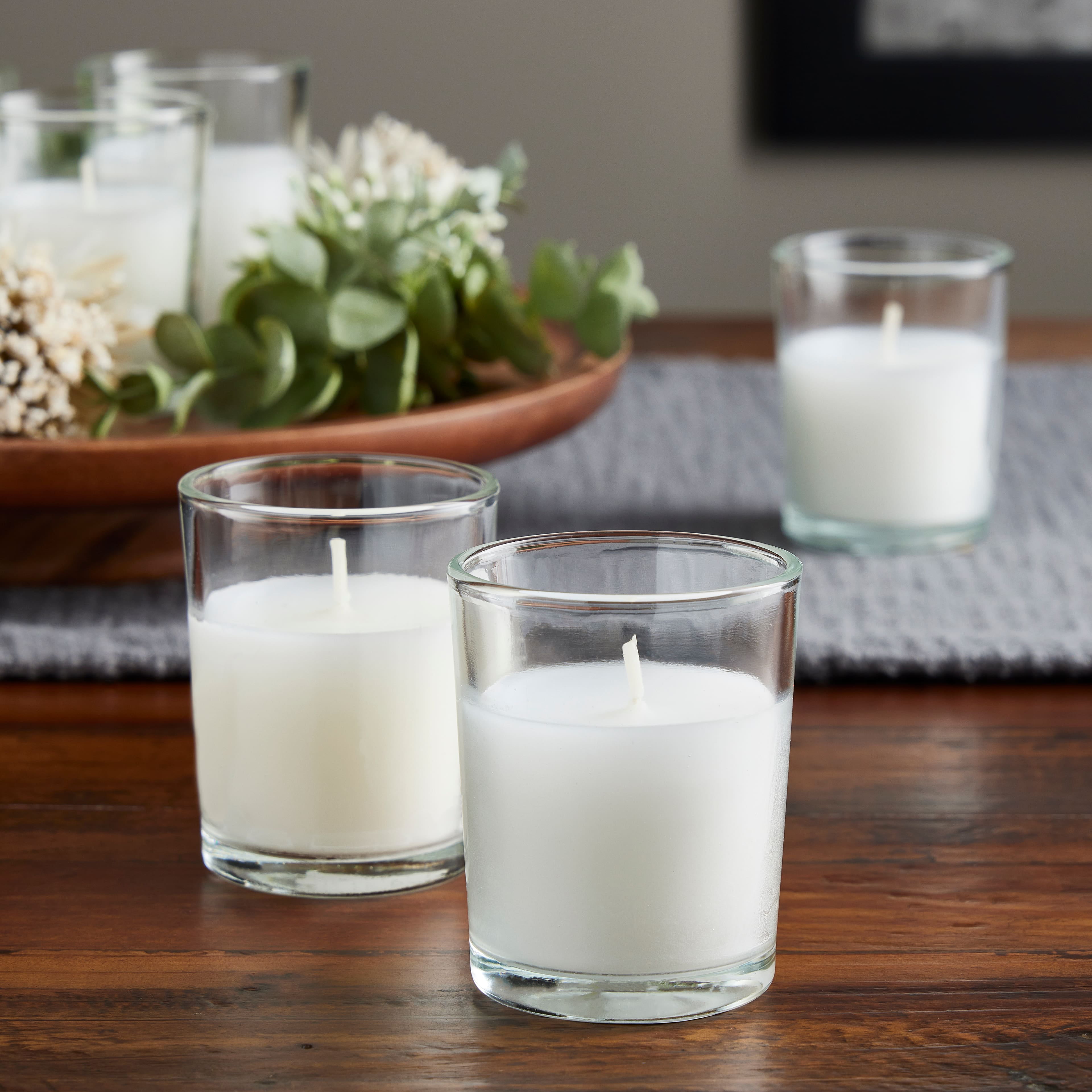 12 Packs: 12 ct. (144 total) White Glass Votive Candles Pack by Ashland®  Basic Elements™