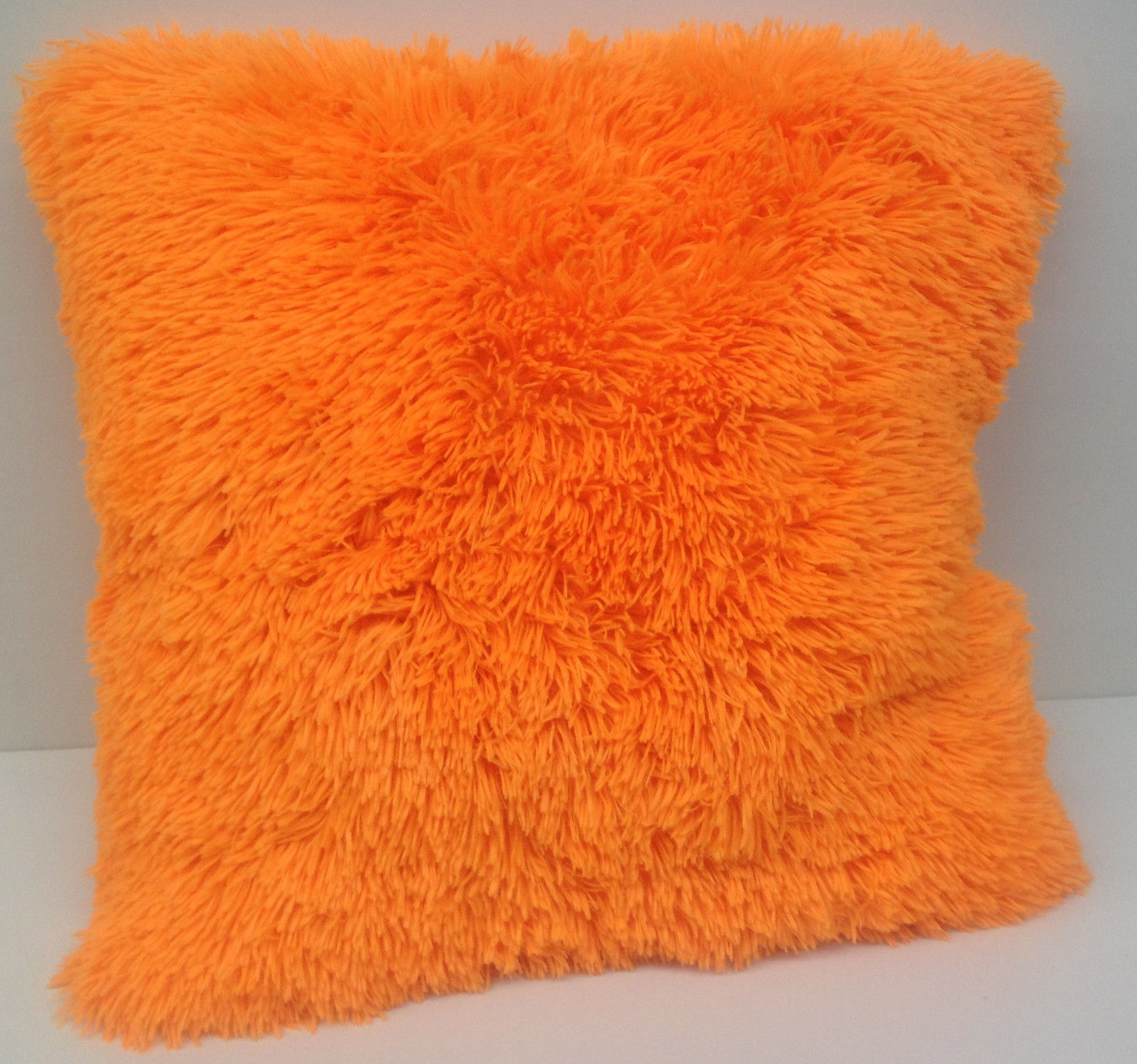bright orange throw pillows