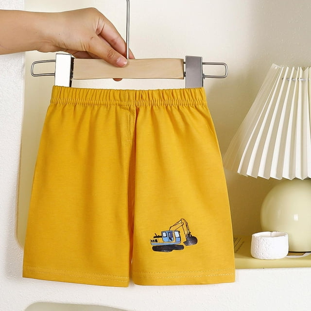 Pantalones cortos deportivos con estampados pequeños para niños y niñas, de poliéster, con cintura elástica.