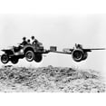 thumbnail image 2 of The New 'Jeep' In Mid-Air As It Pulls A Small Artillery Piece Ca. 1941 History (24 x 18), 2 of 2
