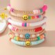 thumbnail image 1 of Conjunto de pulseras de estilo bohemio con joyas Y2K de color suave y cerámica con forma de corazón sonriente y perlas, 1 of 6