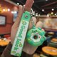 thumbnail image 3 of Llavero creativo con forma de donut de PVC de goma suave con forma de dinosaurio para coche, colgante de bolso para niños kawaii, accesorios de cumpleaños, 3 of 5