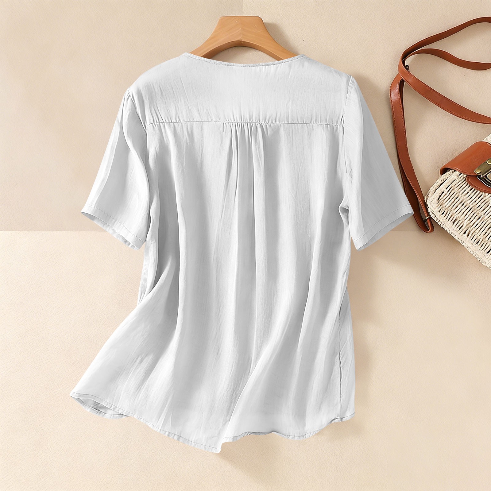 Ropa de mujer algodón lino color sólido cuello redondo bordado manga corta holgada uso diario deporte fitness versátil 7