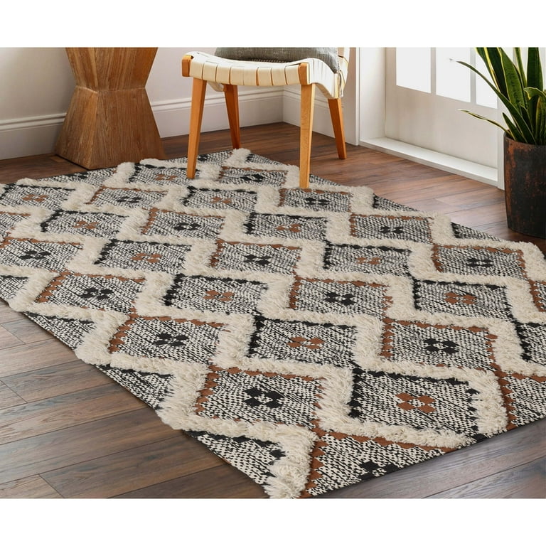 5' x 8' Ivory and Black Southwestern Hand Tufted Non Skid Area Rug 5' x 8' Ivory and Black Southwestern Hand Tufted Non Skid Area Rug