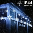 thumbnail image 4 of Luces navideñas de copo de nieve para exteriores 17.22ft 264 LED Luces de carámbano de copo de nieve con 22 gotas Conectables 8 modos Luces navideñas blancas impermeables para cortinas Aleros Ventanas Decoraciones de patio Navidad esquí esquí Gafas de esquí, 4 of 5