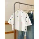 thumbnail image 2 of Blusa Casual De Manga Corta Blanco Con Estampado Multicolor De Corazones, 2 of 30