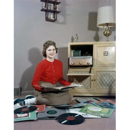 Posterazzi SAL255422646 Young Woman Sitting on Floor & Choosing Vinyl Records Poster Print - 18 x 24 in.