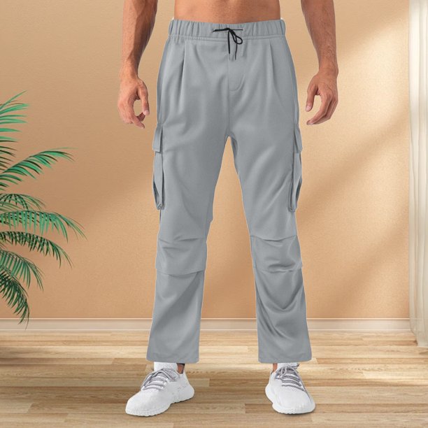Pantalones largos para hombre, casuales, de moda, de color sólido, con cordón, cintura elástica y bolsillos.