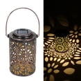 thumbnail image 1 of Lámpara solar de hierro forjado con diseño calado para jardines y patios, ideal para decoración e iluminación exterior. Funciona con energía solar, resistente al agua IP65., 1 of 7