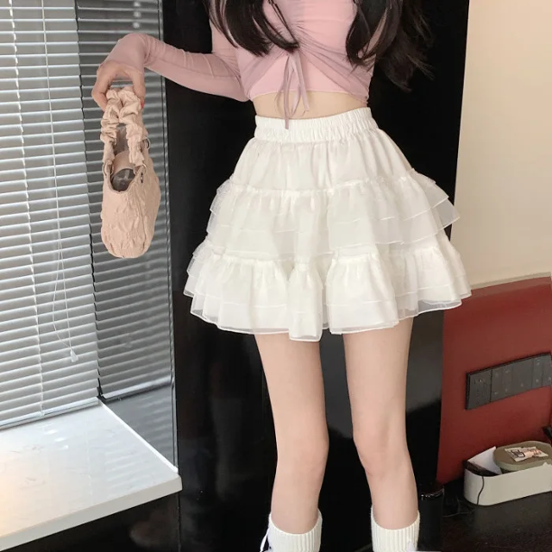 Falda A de encaje con cintura alta y forma de huevo, estilo nuevo de verano de 2024, falda de encaje blanca con mangas abullonadas, de moda para mujer