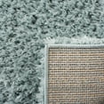 thumbnail image 6 of SAFAVIEH Madrid Miah Solid Polyester Shag Area Rug, Aqua, 4' x 6', 6 of 10