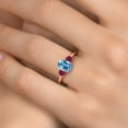 thumbnail image 4 of Gem Stone King 2.00 Ct Oval Swiss Blue Topaz Red Created Ruby 18K Rose Gold Plated Silver Ring, 4 of 6