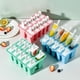 thumbnail image 1 of Moldes reutilizables para polos con palos, pack de 4 - moldes de silicona de fácil liberación para helados caseros, sin BPA (verde menta, rojo sandía, azul), 1 of 6