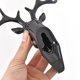 thumbnail image 5 of Yuarrent Gancho para colgar en la pared de plástico con cabeza de ciervo, bolsa para sombrero, estante para joyería, adhesivo para decoración Almacenamiento y organización del hogar Negro, 5 of 6