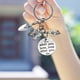 thumbnail image 4 of Llaveros para mujer, llavero de billetera, llavero de auto, llavero lindo con frase "DO What You Flower Spade DIY Creative Gardener Keychain Dish Towel", 4 of 5