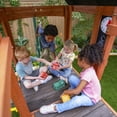 KidKraft Raptor Trail Wooden Outdoor Swing Set with Wavy Slide and Rock