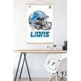 thumbnail image 5 of NFL Detroit Lions - Drip Helmet 20 Wall Poster with Wooden Magnetic Frame, 22.375" x 34", 5 of 5