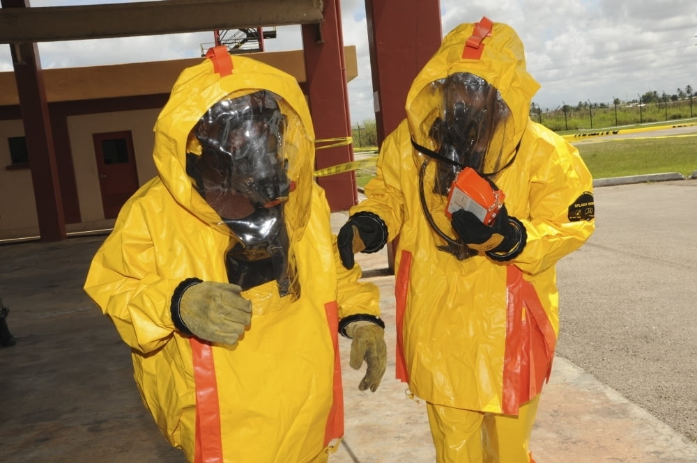 Firefighters dressed in hazmat suits Poster Print (17 x 11) Walmart