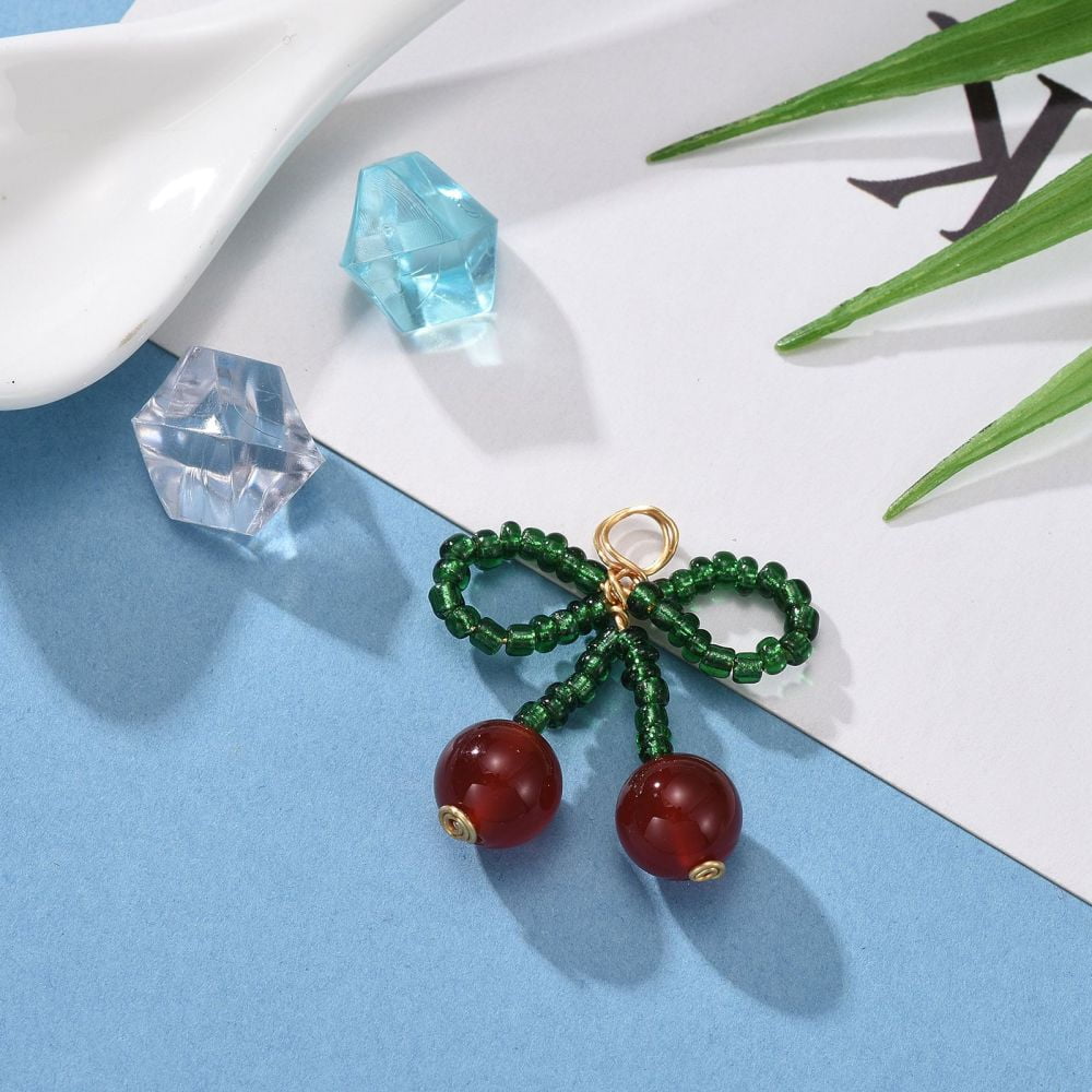 50pcs Glass Seed Beads Pendants with Red Agate Carnelian Beads and Copper Wire Bowknot Green & Red golden 26x25x8mm Hole: 4.5mm Beads: 8mm