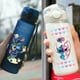 thumbnail image 2 of Botella de agua Lilo & Stitch de 560/600/400 ml para niños, portátil, de plástico transparente, con pajita, para exteriores, gran capacidad, para deportes, L-4, 2 of 6