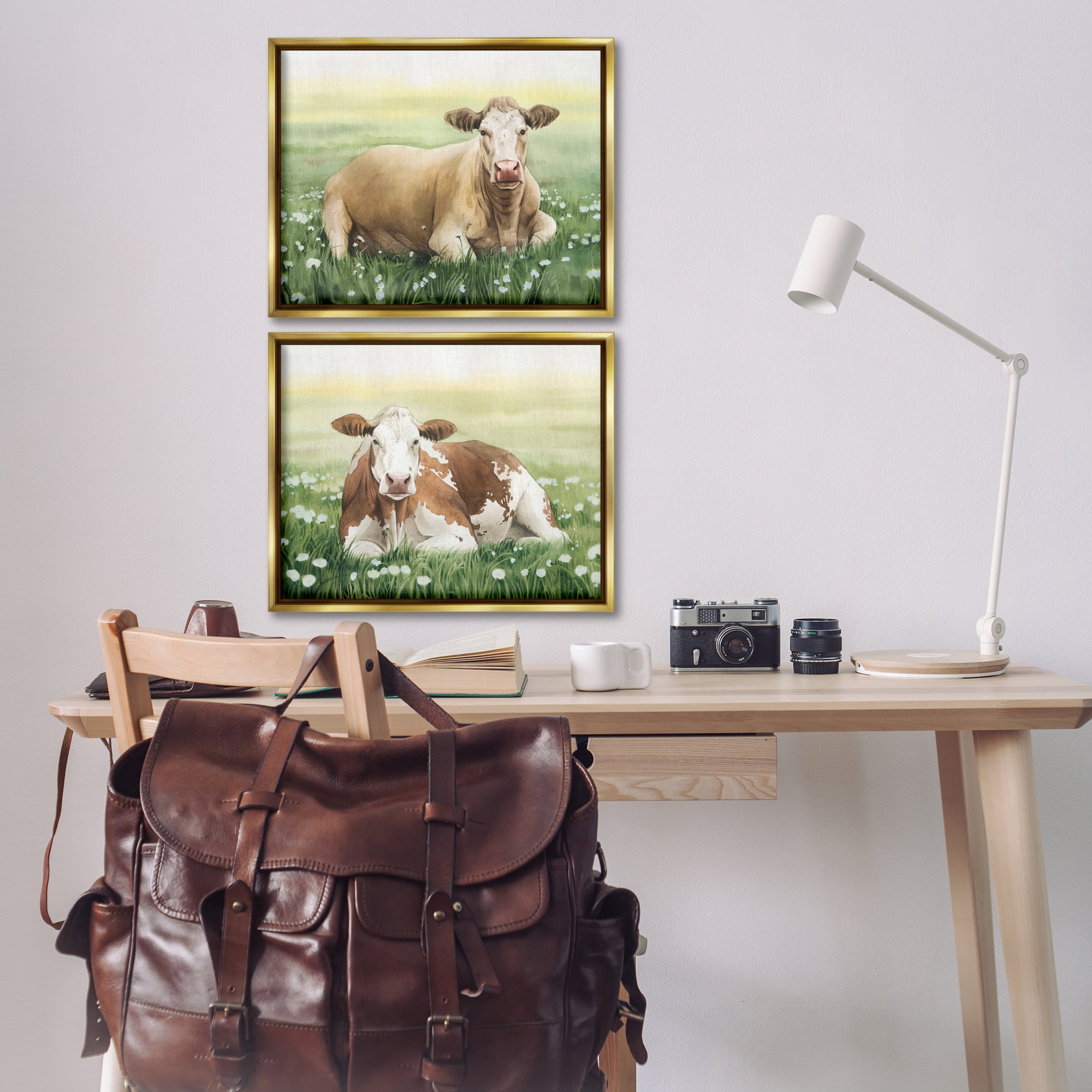 Stupell Industries Cows Resting in Flower Field Animals Painting Gold Floater Framed Canvas Art Print Wall Art, 21 x 17, Set of 2