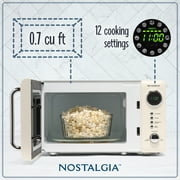 Nostalgia 0.7 cu ft Retro Microwave Oven, 700W Countertop Microwave Oven with Accessory Bundle, Cream