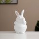 thumbnail image 5 of Decoración de conejo de Pascua – Figurita de decoración primaveral, adorno de resina con huevos y flores, blanco, 7,20 x 5,04 x 4,64 in, 5 of 6