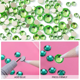 thumbnail image 4 of Verde, arte de uñas con pedrería verde y parte posterior plana de cristal, 4 of 5