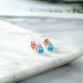 thumbnail image 4 of Gem Stone King 18K Yellow Gold Plated Silver Swiss Blue Topaz Stud Earrings for Women Men (1.96 Cttw, Gemstone November Birthstone, Pear Shape 8X5MM), 4 of 4